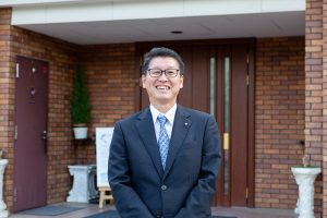 丸山利昭の経歴